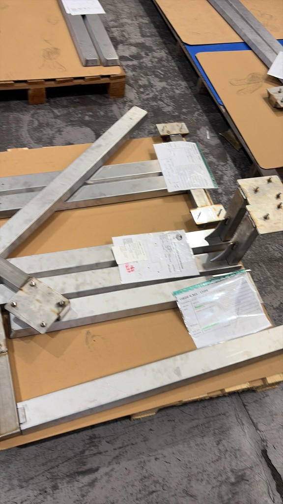 Bespoke LoadBear awning brackets with order sheets fully inspected and ready for paint
