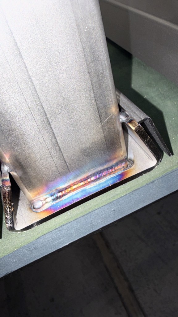 Close-up TIG weld joint on a stainless Extreme Gutter Bracket