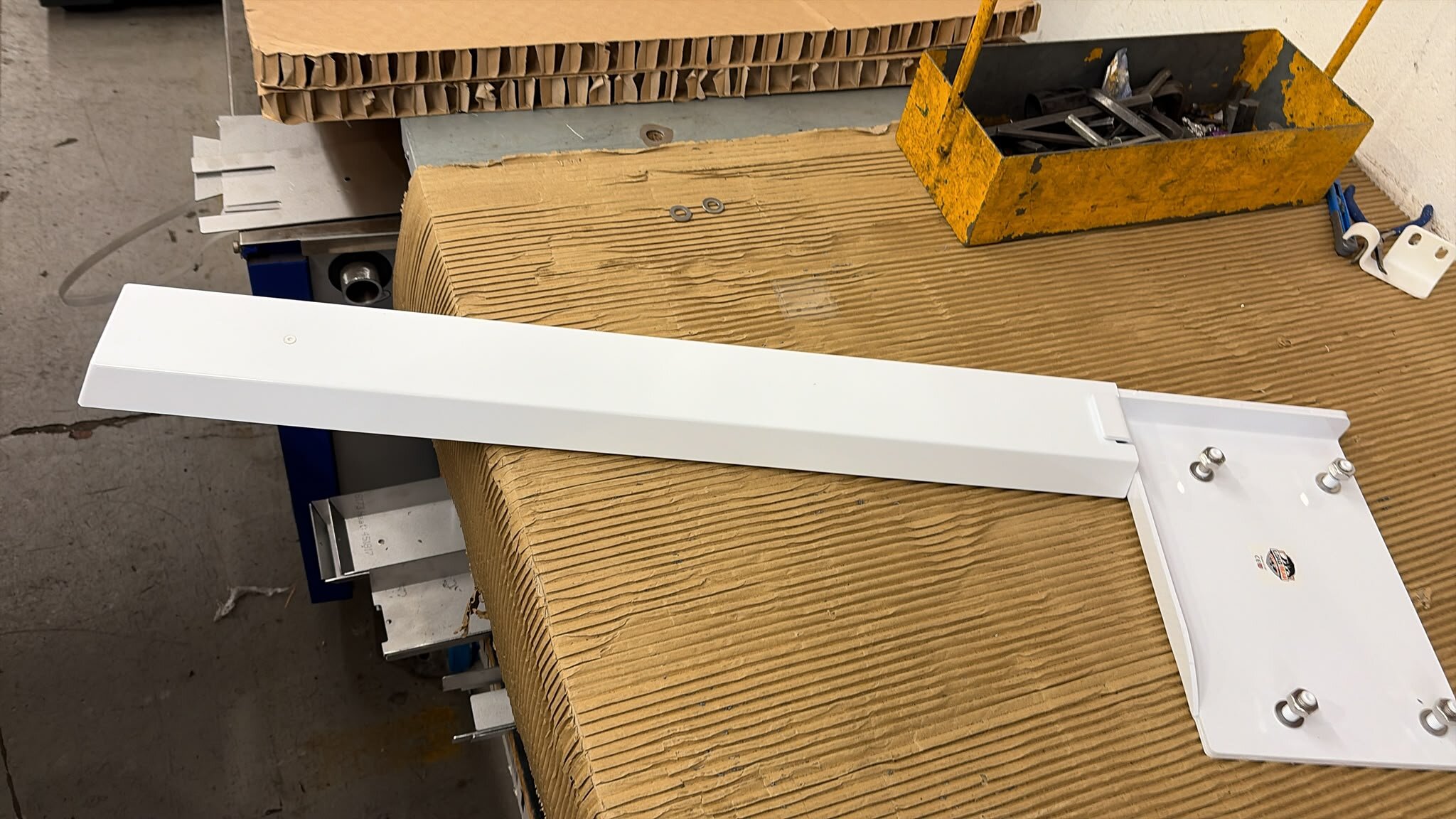 White LoadBear upright with brand logo on the mounting plate