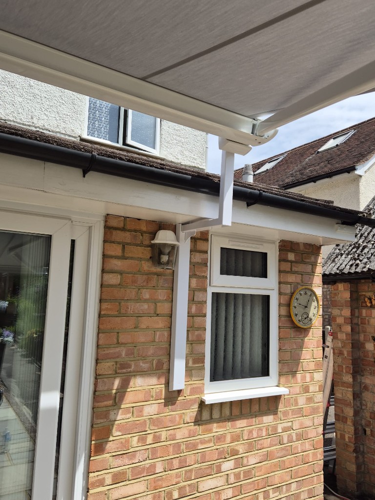 Close-up of LoadBear cranked gutter bracket stepping under the fascia to carry the awning cassette